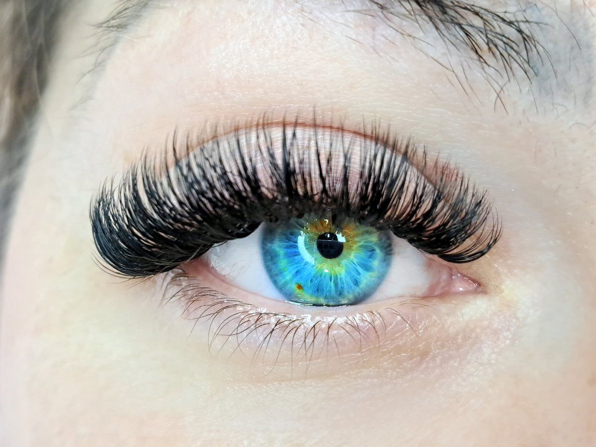 Close up of eye with eyelash extensions ,beauty salon treatment ,2d volume, 3d volume, classical lashes,Russian volume,megavolume, new set